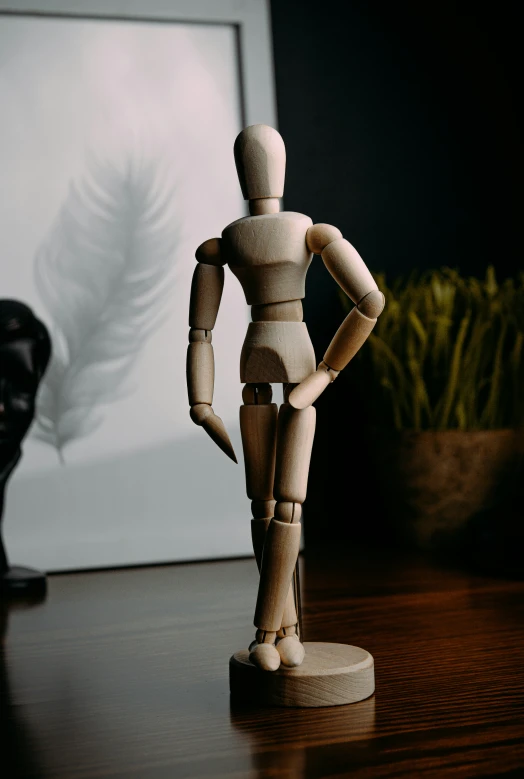 a wooden toy is standing on a table