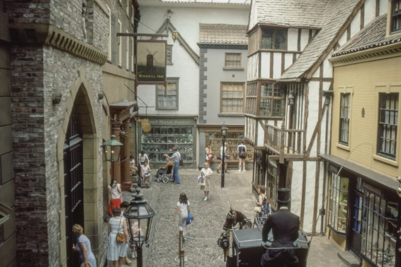 looking down a street at people in the streets