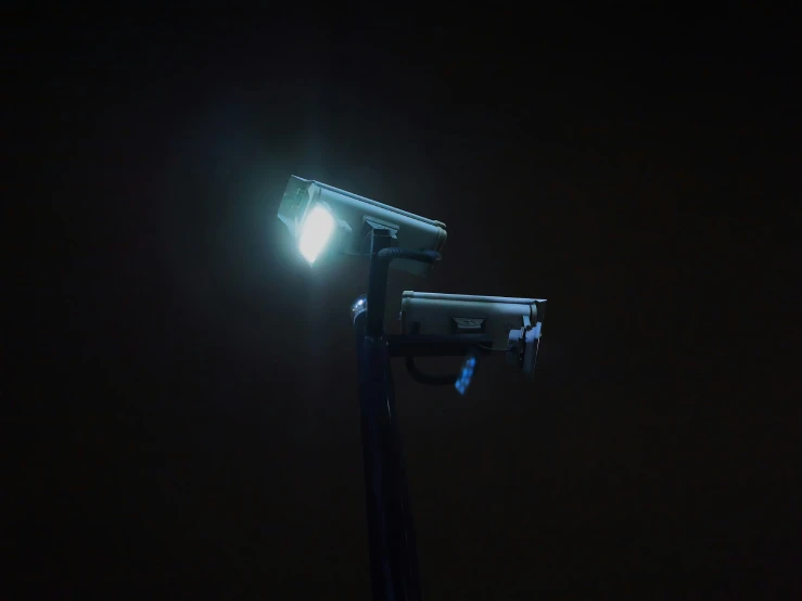 a street light at night with no light on