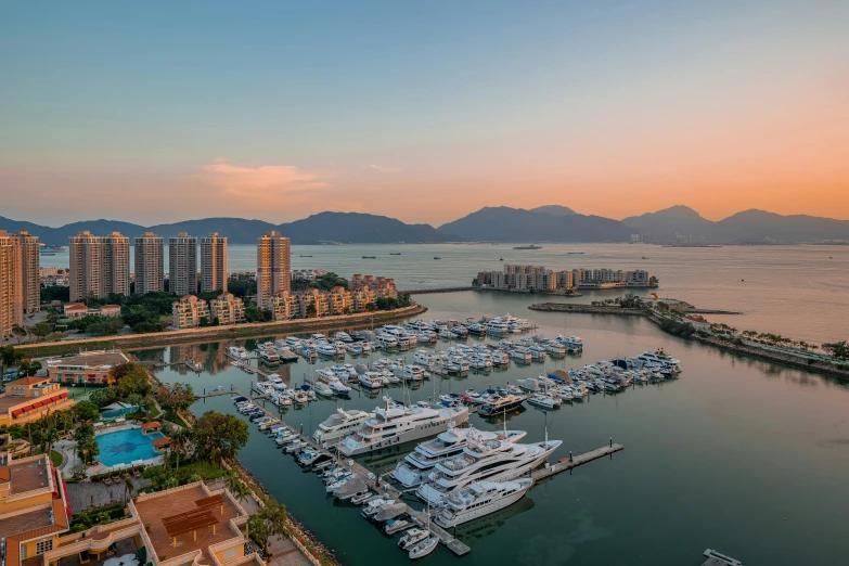 an aerial view of a marina surrounded by buildings