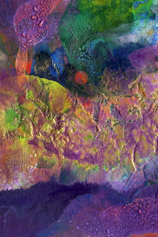 an abstract painting with multicolored paint and water