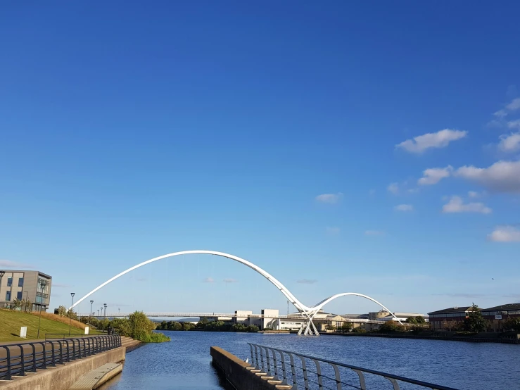 a bridge on the side of a river