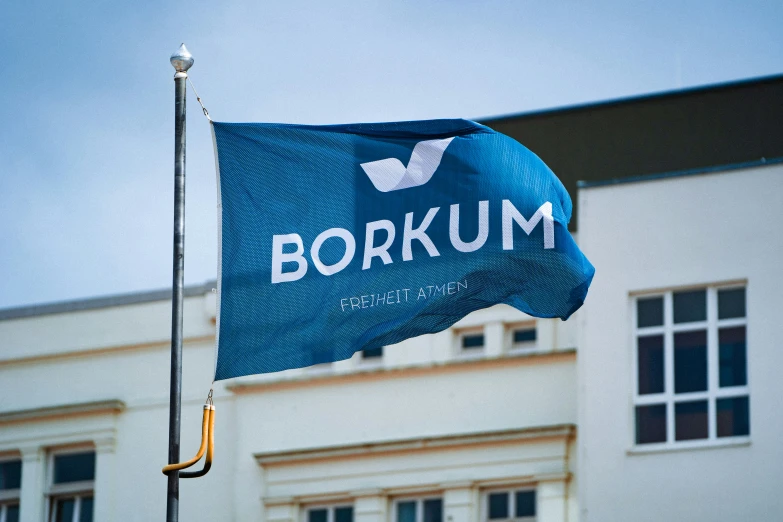 a borkum flag waving in front of a building