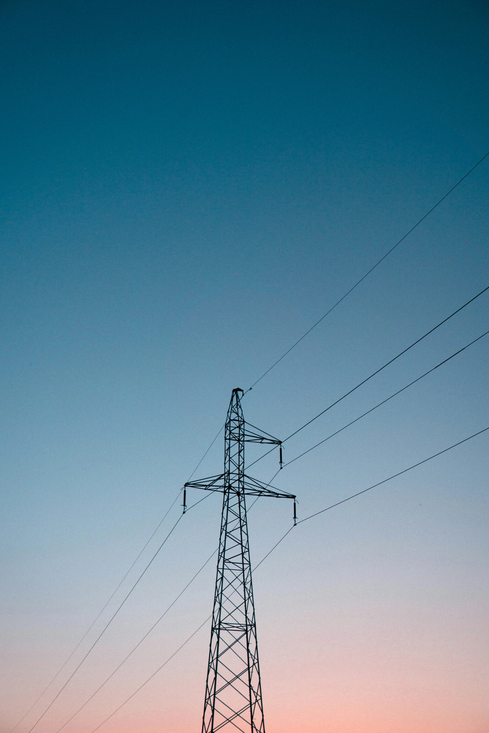 an electric pole with lots of wires on top of it