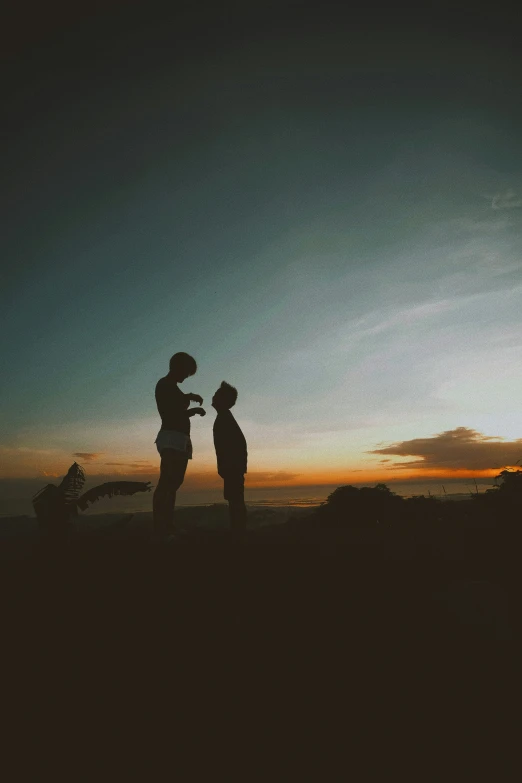 an image of two people on a mountain