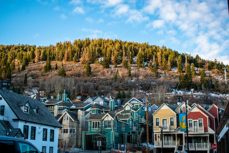 this is some very pretty colorful town that is by a hill