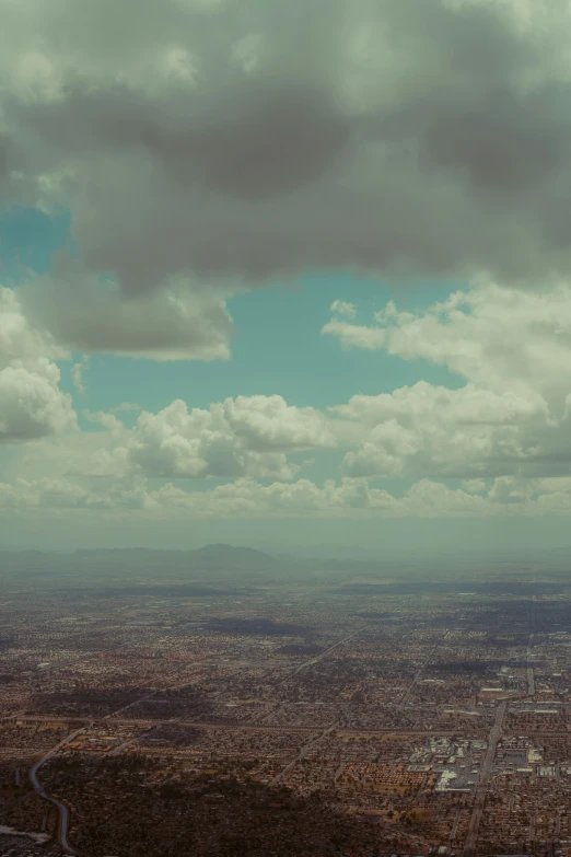 the view from an airplane of the city below