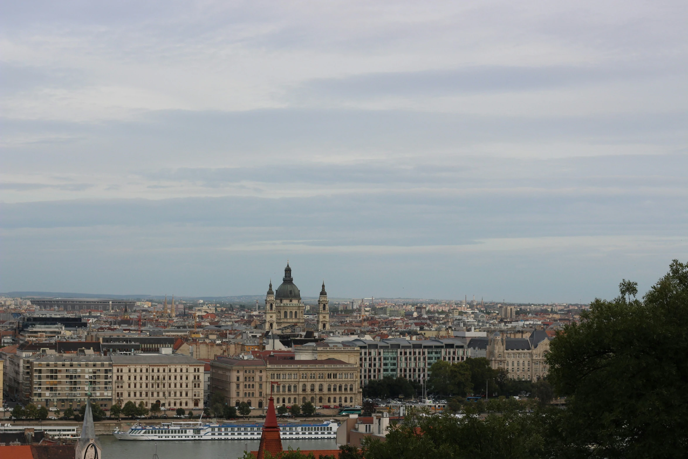 a city skyline is shown in the distance