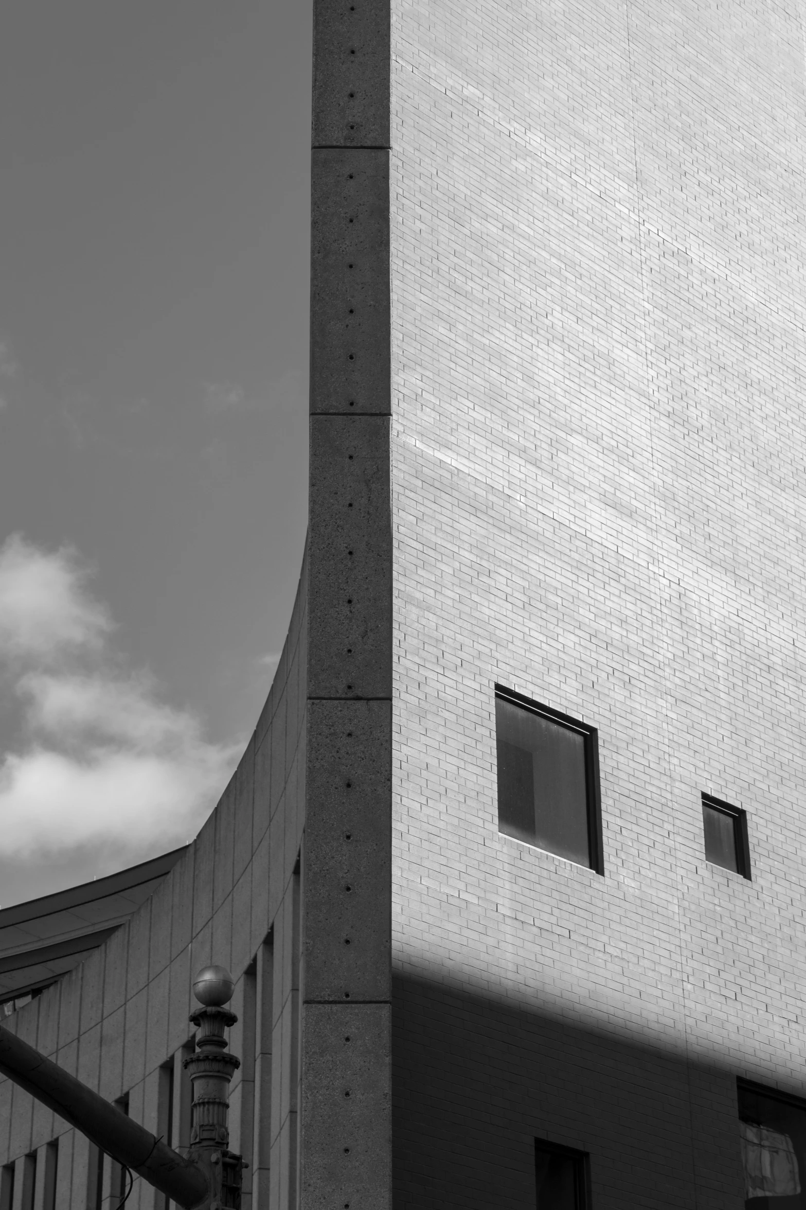 a tall building with several windows on the side