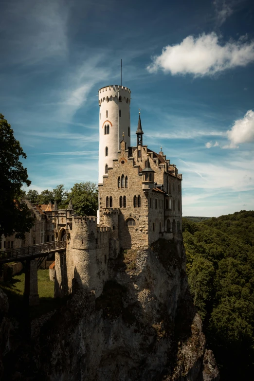 a castle built into the top of a mountain