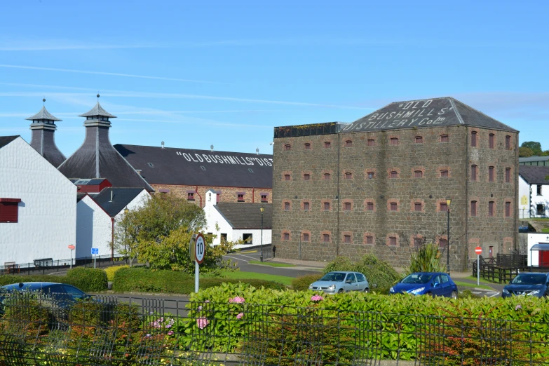 the view of a brick building and surrounding area