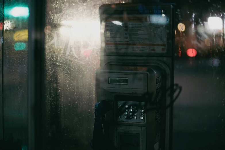 a meter is in front of a store with the light on