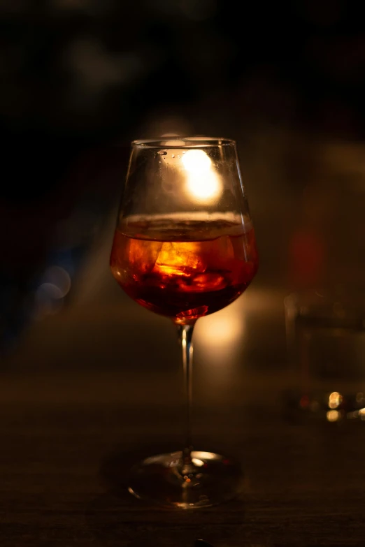 a glass filled with liquid on a table