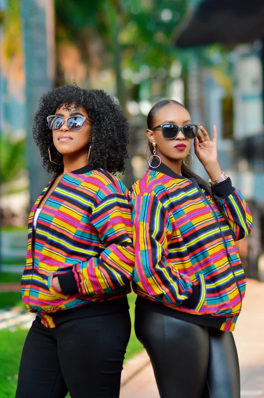 two women in glasses standing side by side