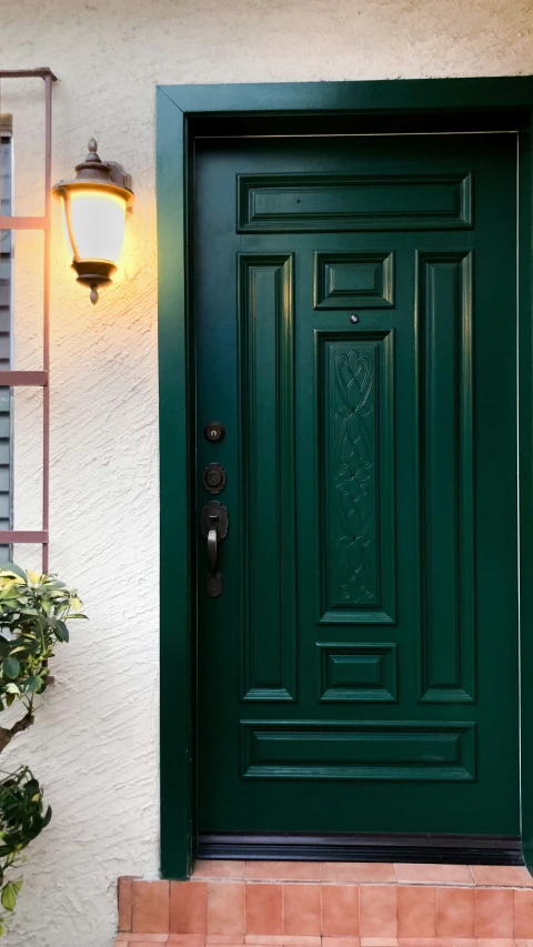 a green front door of a house