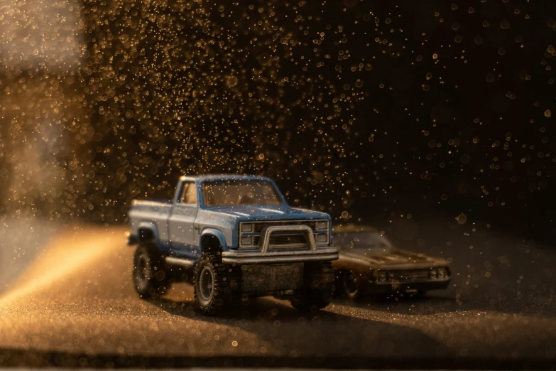 a blue truck on the side of a road