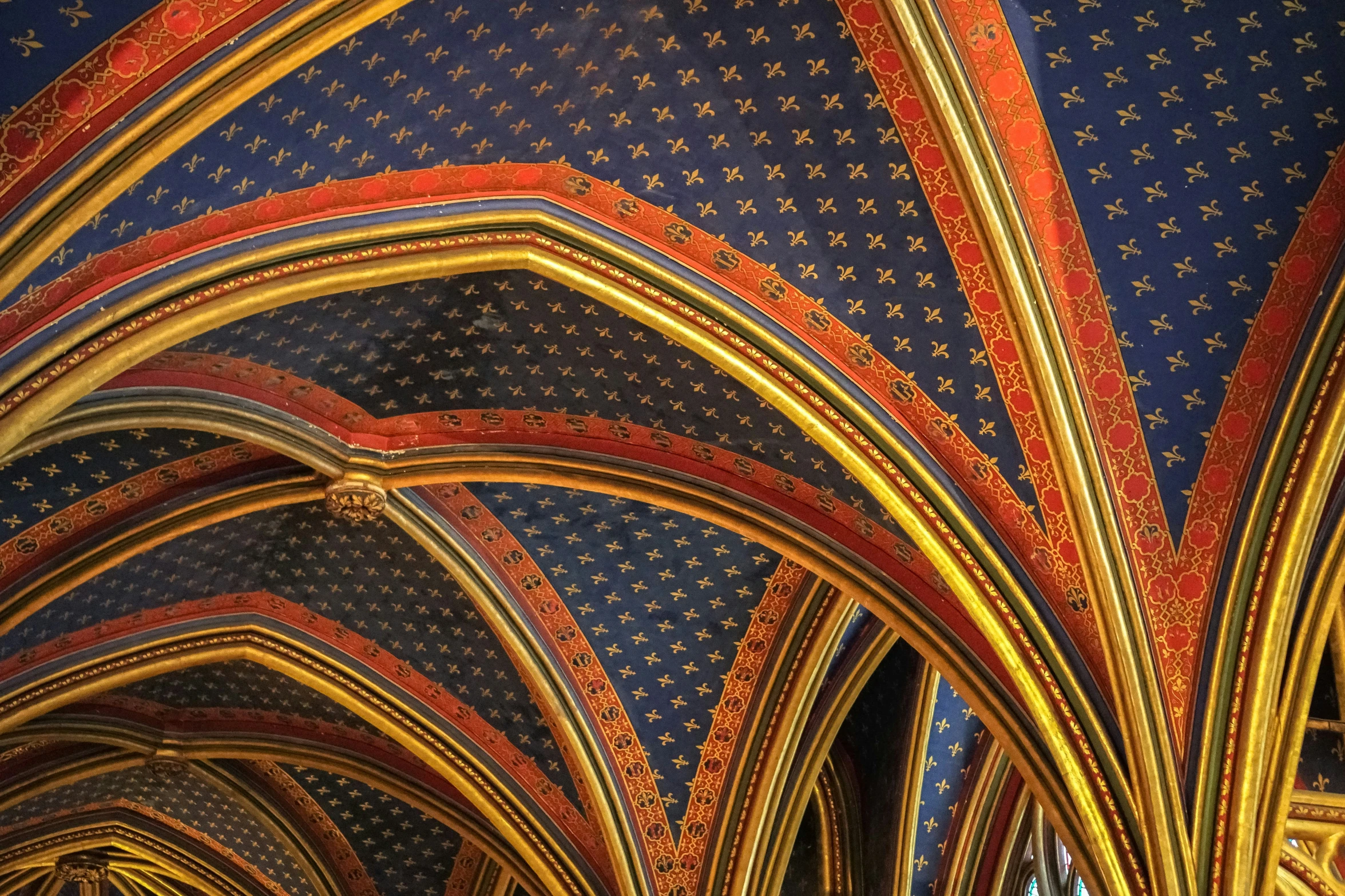 many ceiling tiles and designs in a cathedral