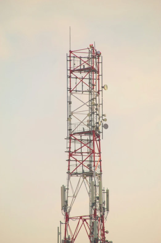 there are several electrical wires attached to the tower