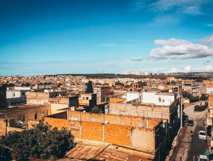 a view of the city from the top of an old building