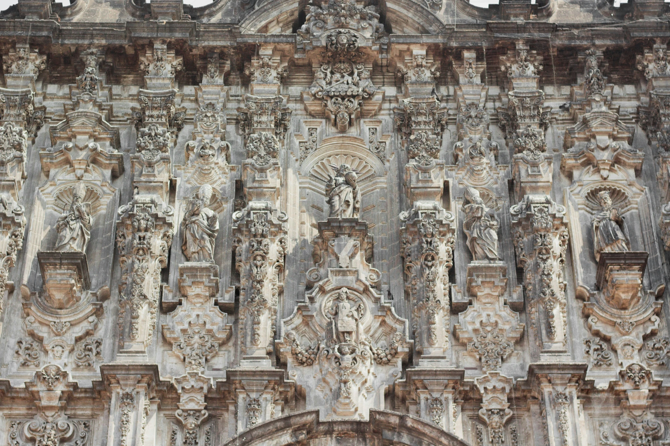 architectural details all over the wall of a building