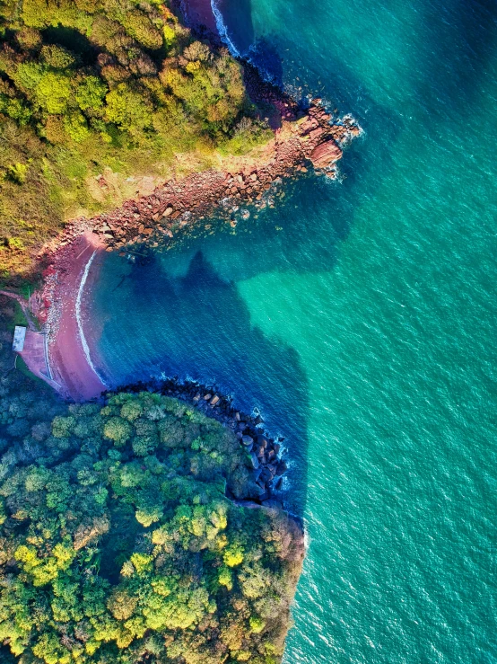 an aerial view of a large blue body of water