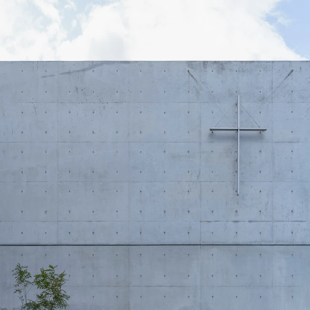 an empty building with a clock mounted to the wall