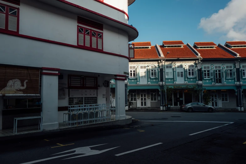 several buildings with red and white roofs that have the word cat on them