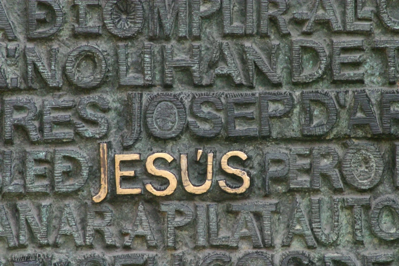 there is a carving of the words jesus on this wall