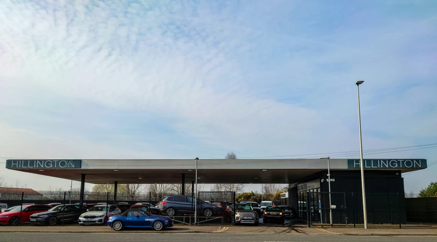 a parking lot with cars parked and empty