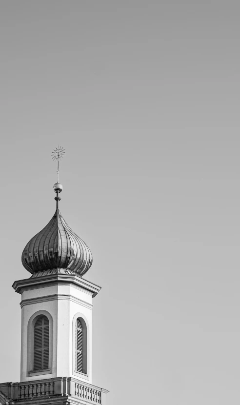 a clock tower is shown with no people around