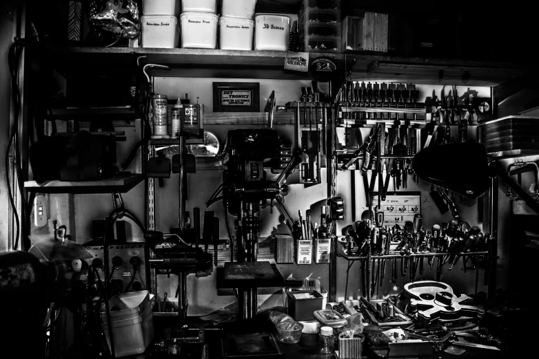 an organized kitchen with black and white colors