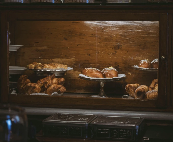 a window display showing baked goods inside