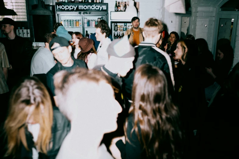 people mingle at an indoor birthday party