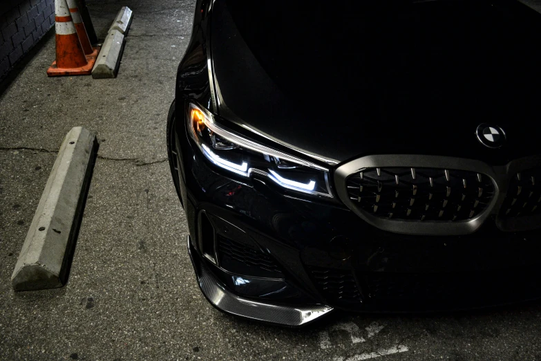 a black sports car parked on a street