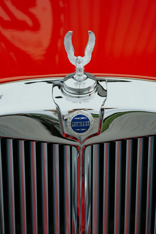 the emblem of the classic car on the front grill