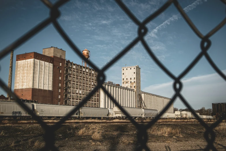 a building from across a fenced in area