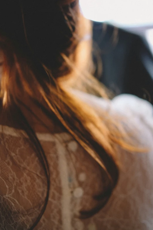 a woman holding up a smart phone in her hand