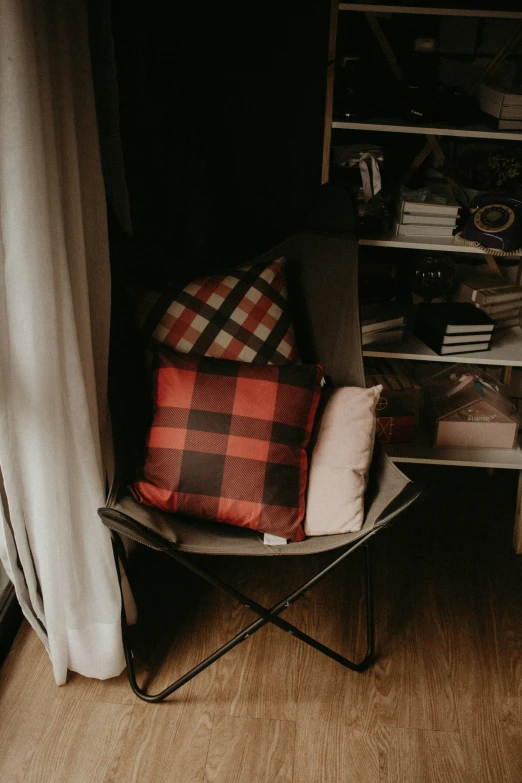 an assortment of items sitting on a small chair