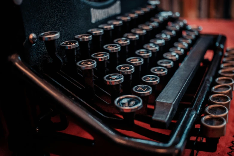 a black typewriter with lots of ons and ons