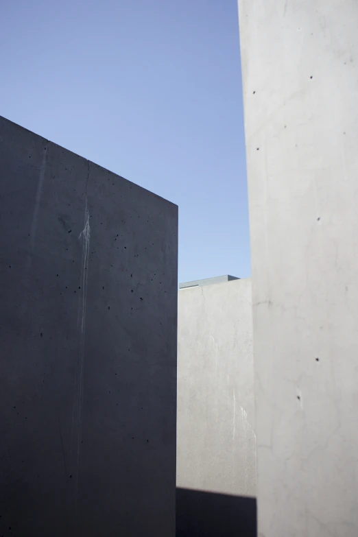 a view of the top of two cement buildings