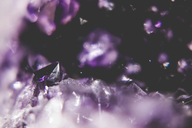 crystals sitting on a counter top covered in rain