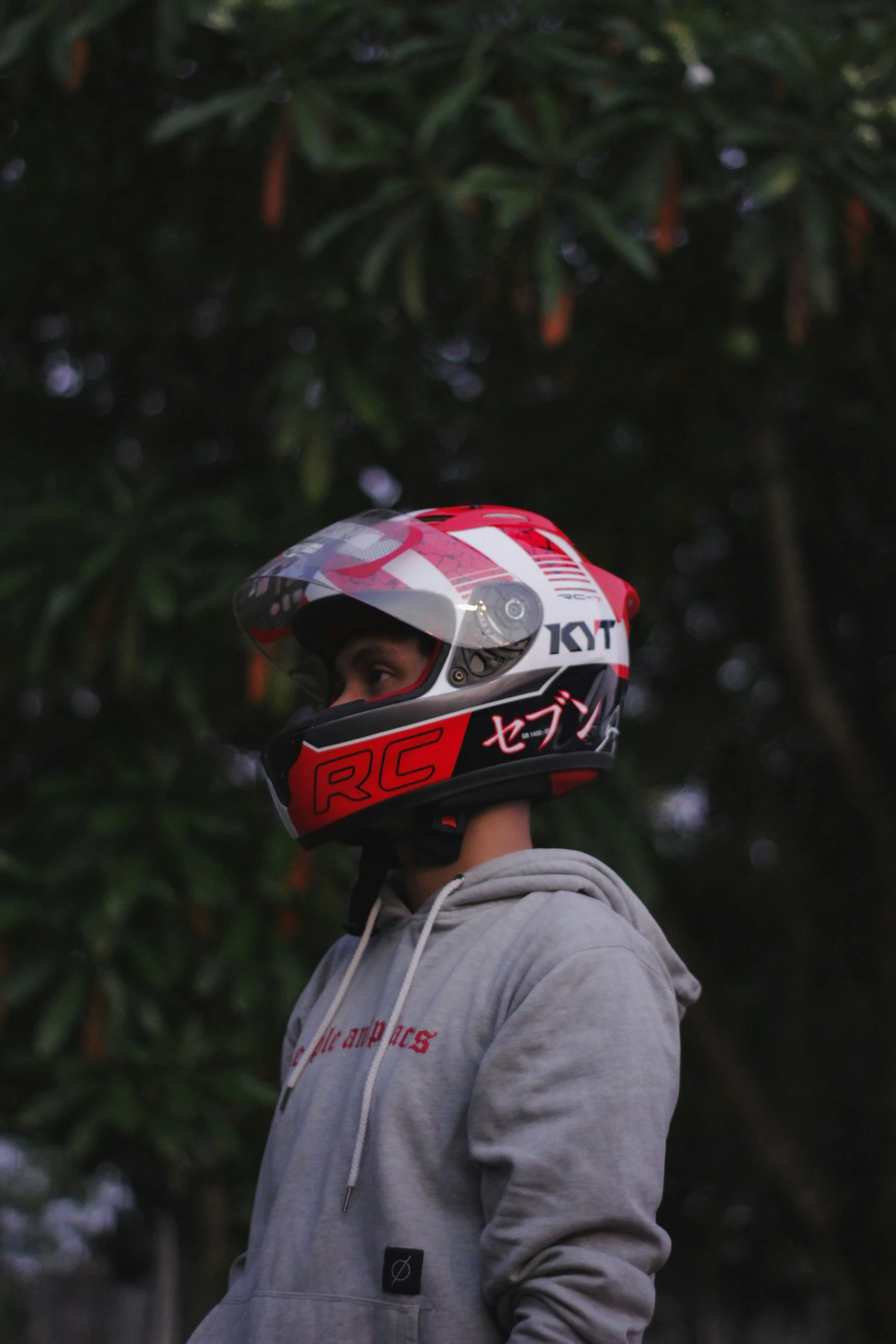 a man wearing a helmet, jacket and hood