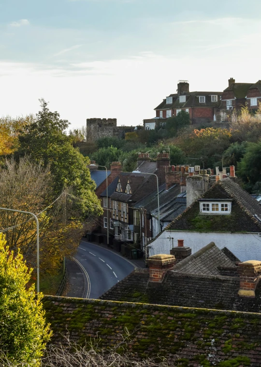 small town with buildings surrounded by trees and hills