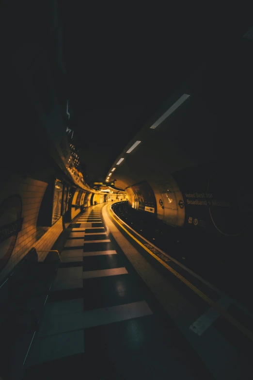 a long tunnel with light moving through it