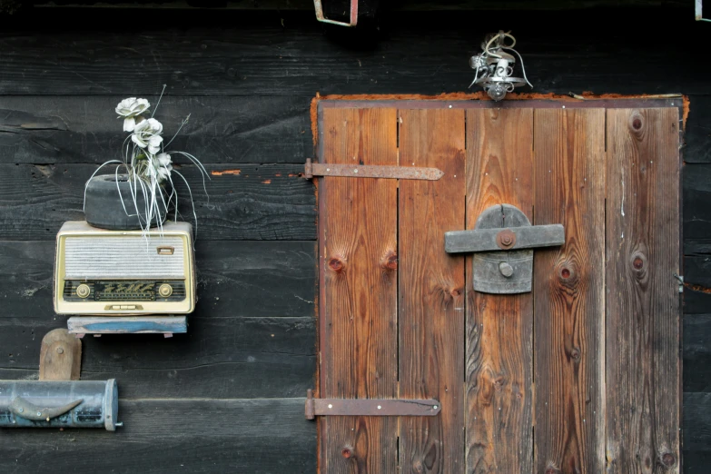 a close up of a door with flowers on it