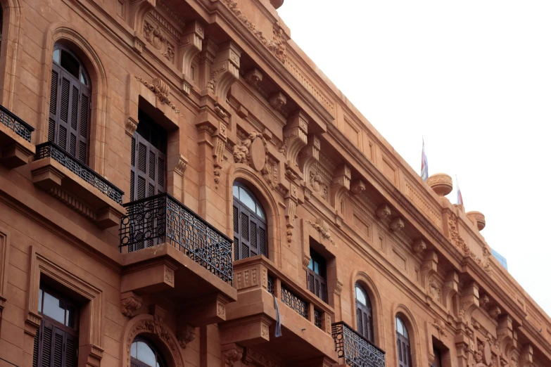 a large building with ornate windows and balconies