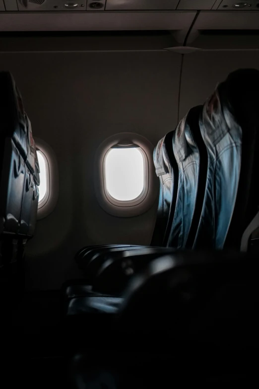 view of the airplane and the seat seats through the window