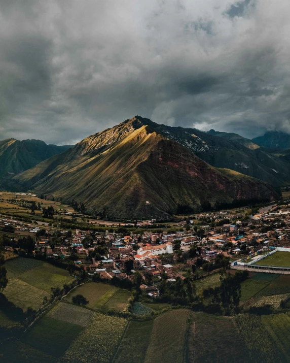 a view of a town and mountains from the air