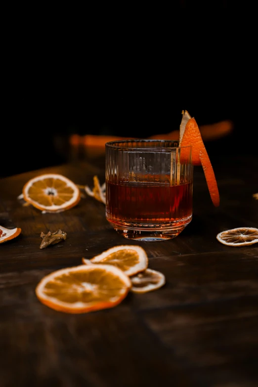 the table has sliced oranges on it