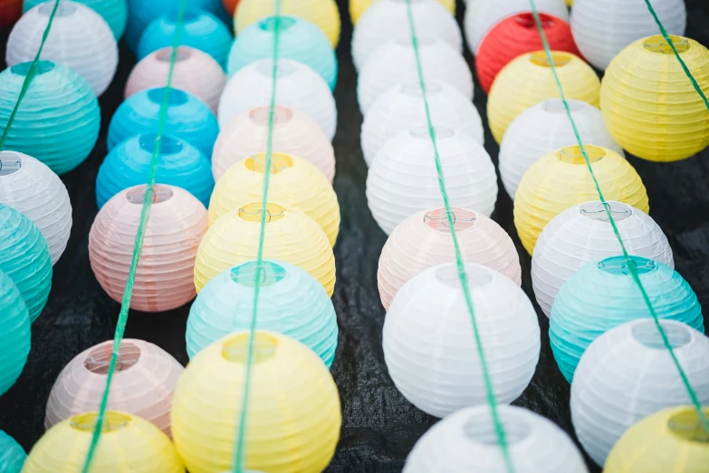 a display of bright colored paper lanterns